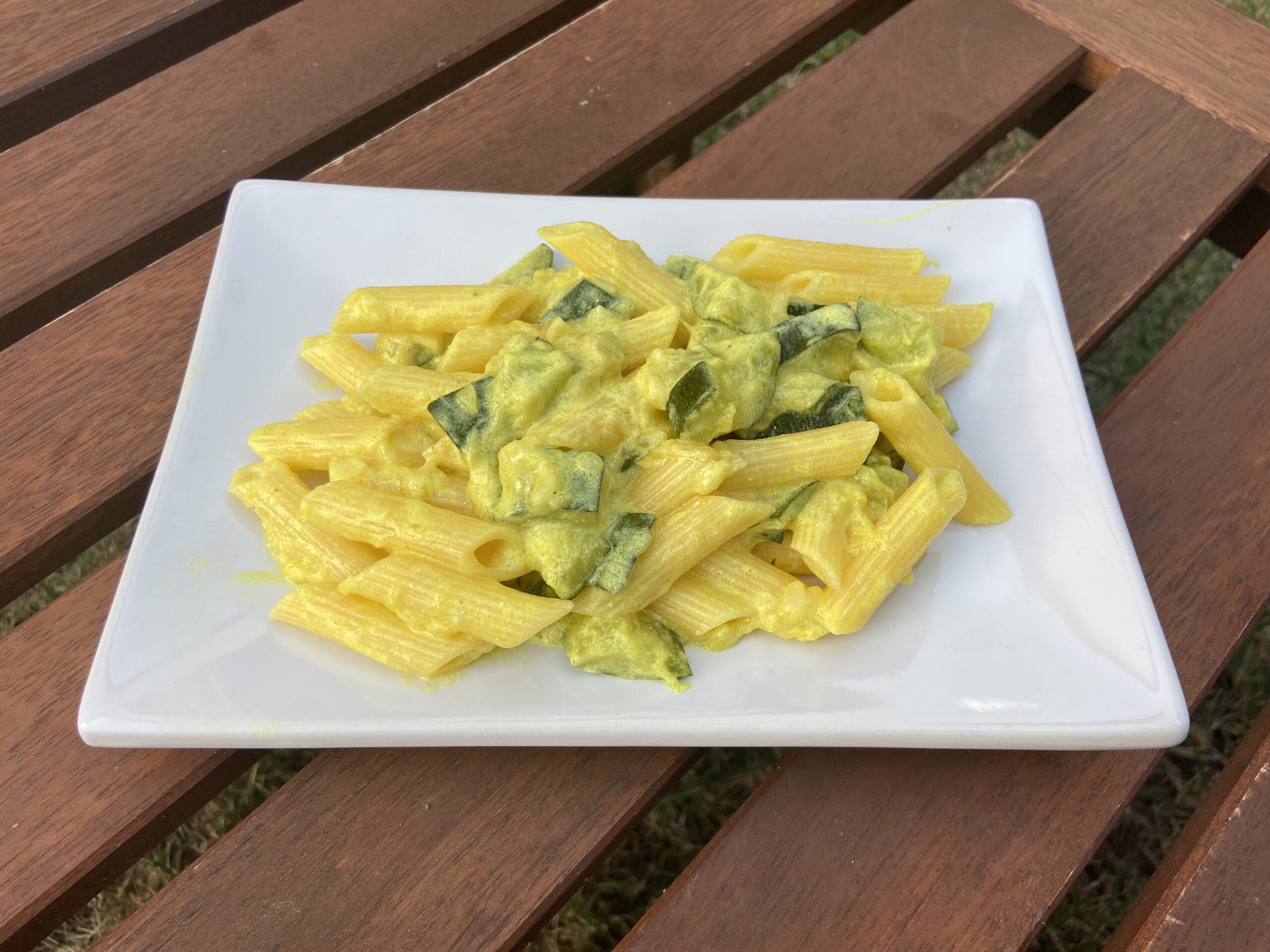 Corn pasta with zucchini and turmeric