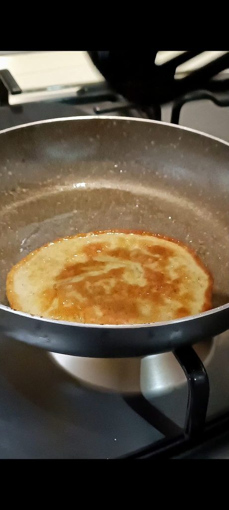 Flip the pancake when it's golden