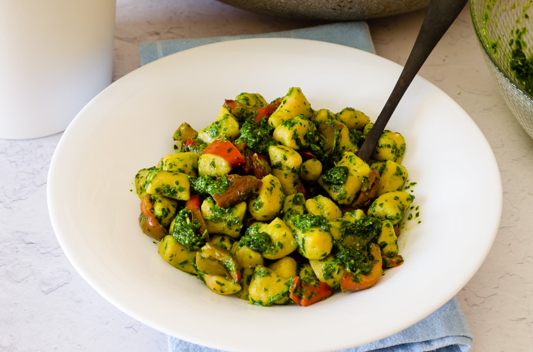 Homemade Chickpea Gnocchi with Arugula Pesto and Bell Peppers