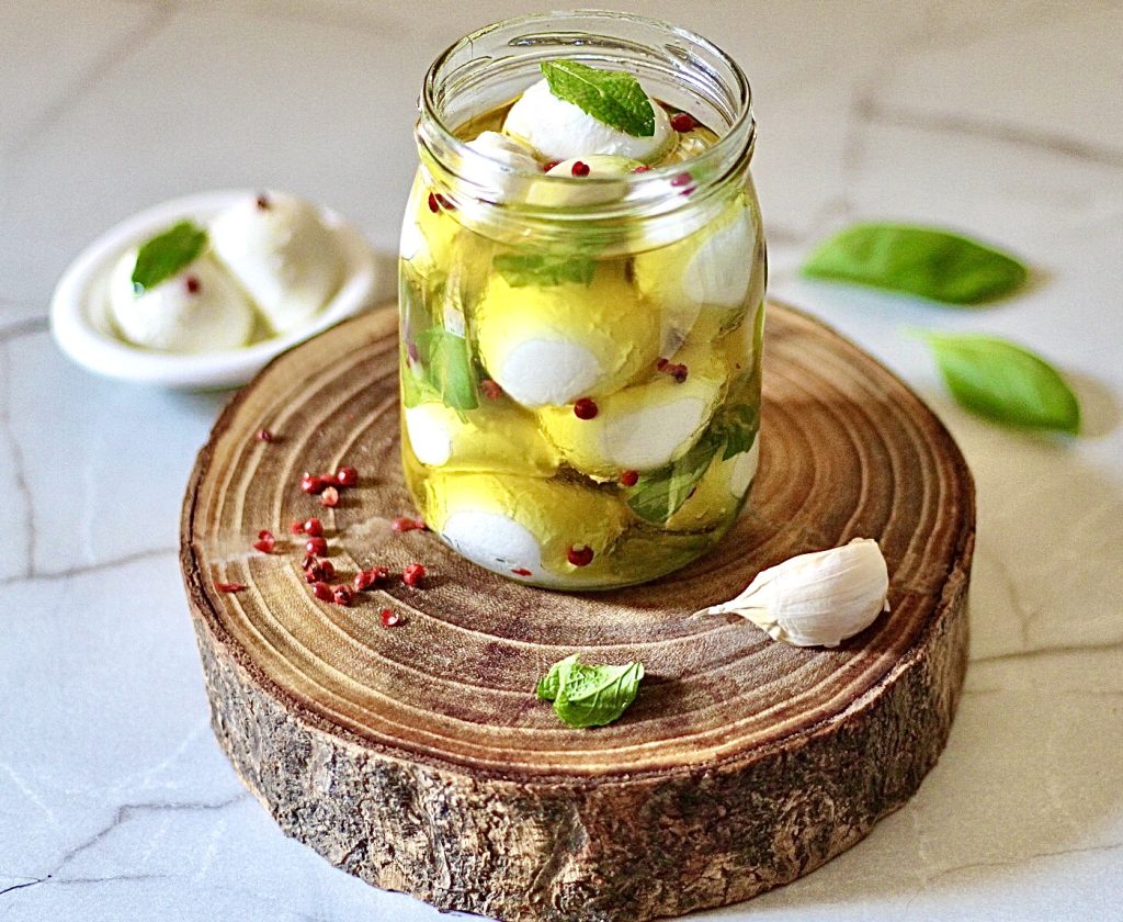 Marinated Mozzarella Bites, fresh and ready to serve at any moment.