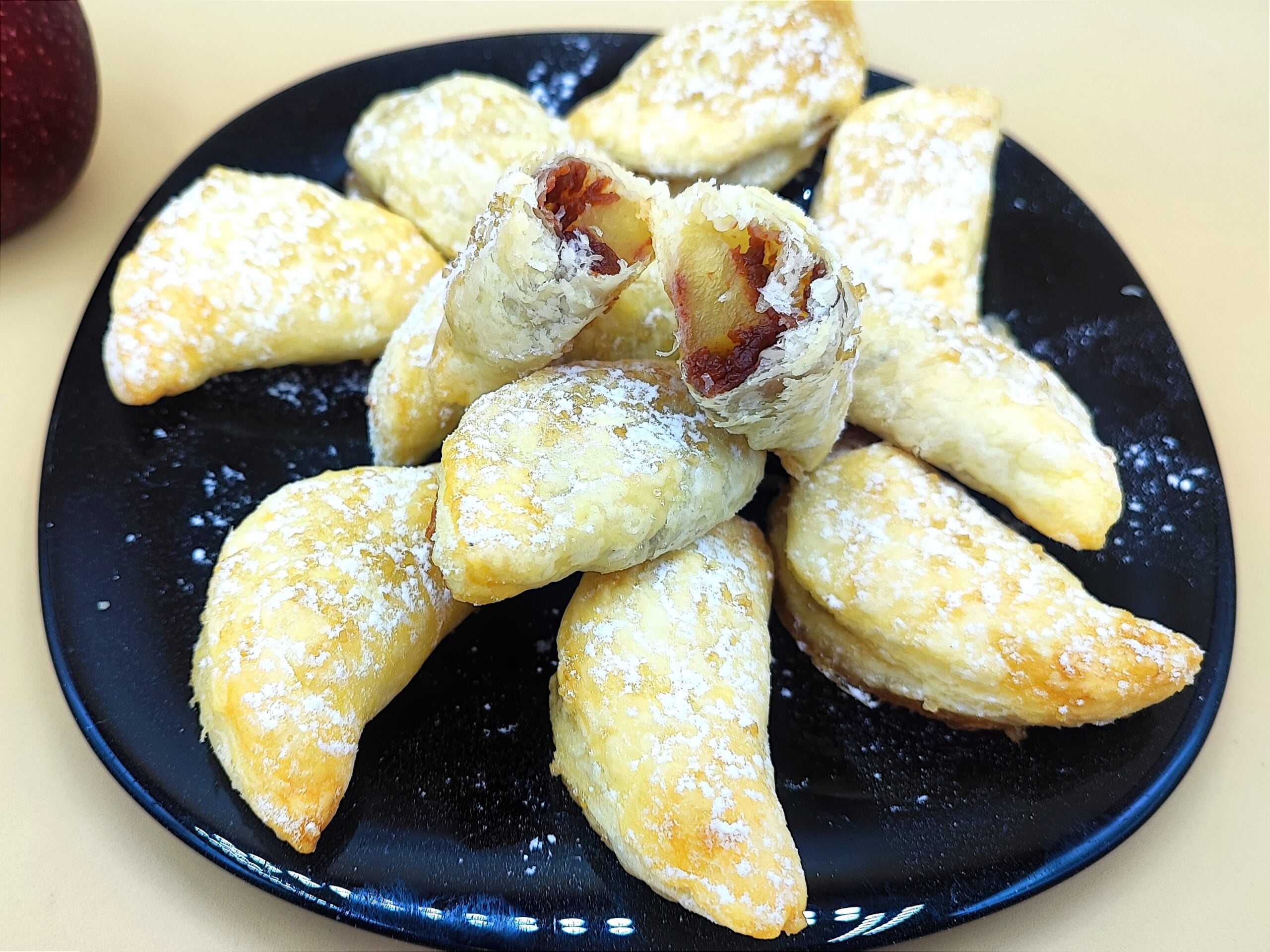 apple wedges with jam wrapped in puff pastry