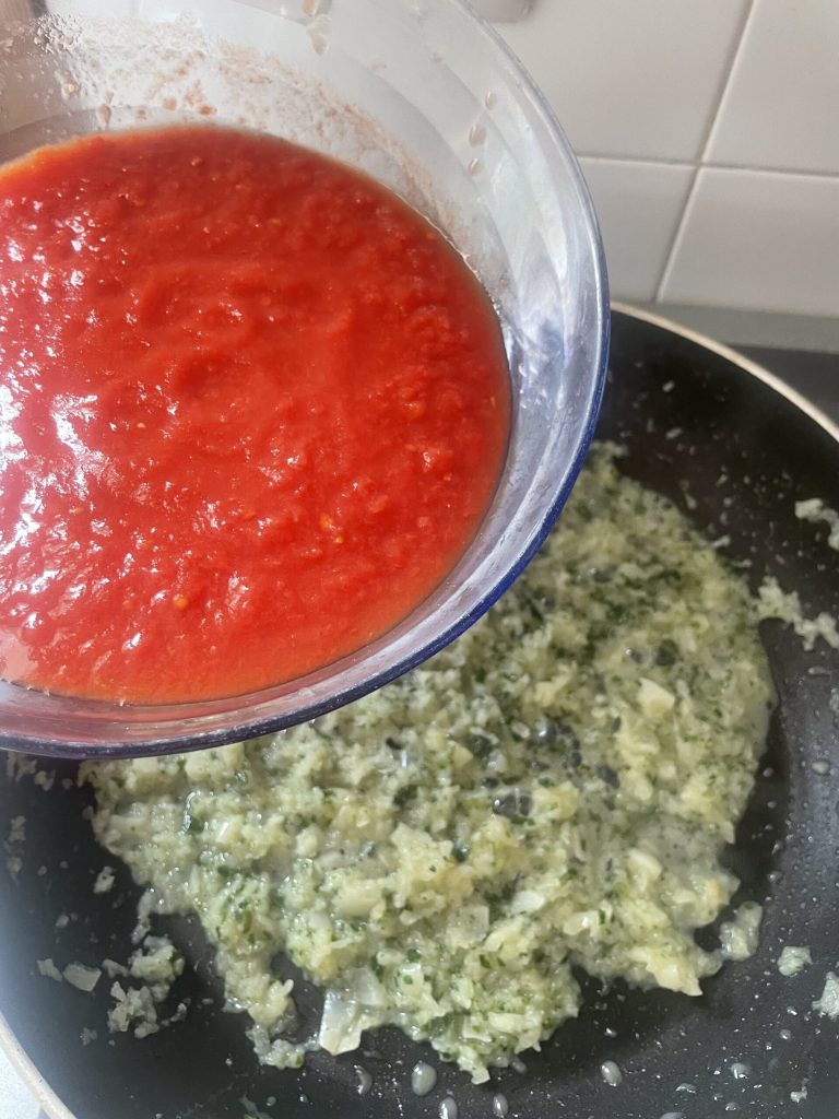 cooked pici with added parsley