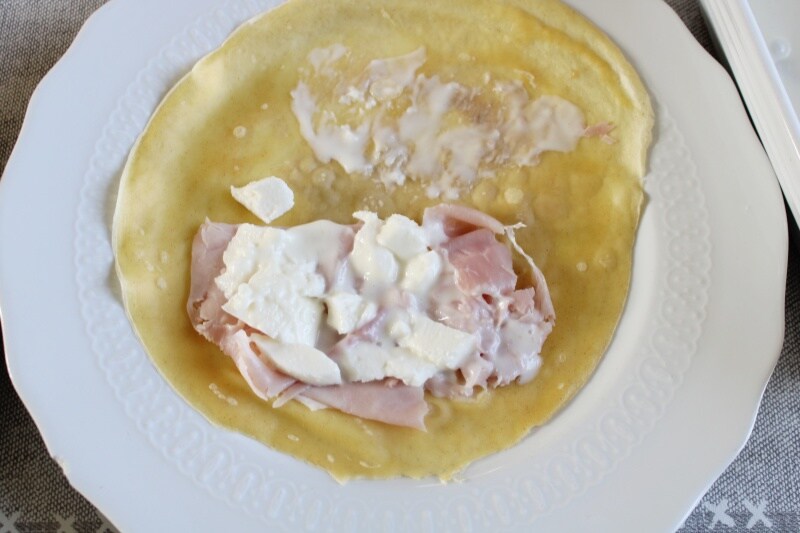 Crepes with ham and béchamel sauce