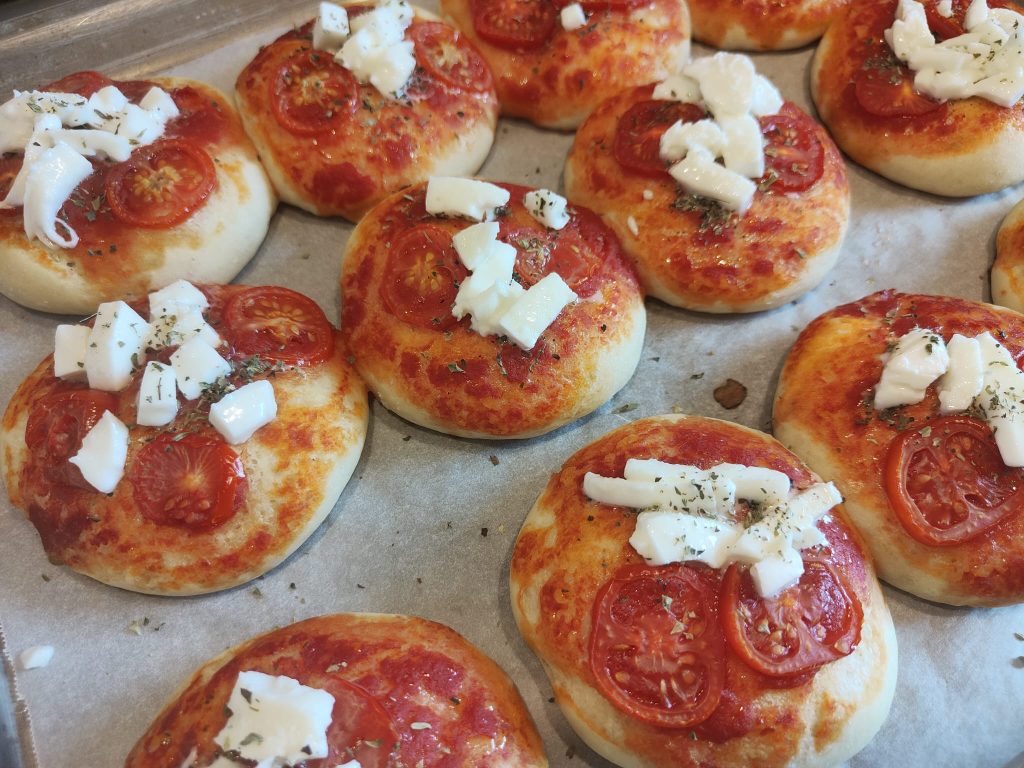 Mini Pizzas with Cherry Tomatoes and Mozzarella