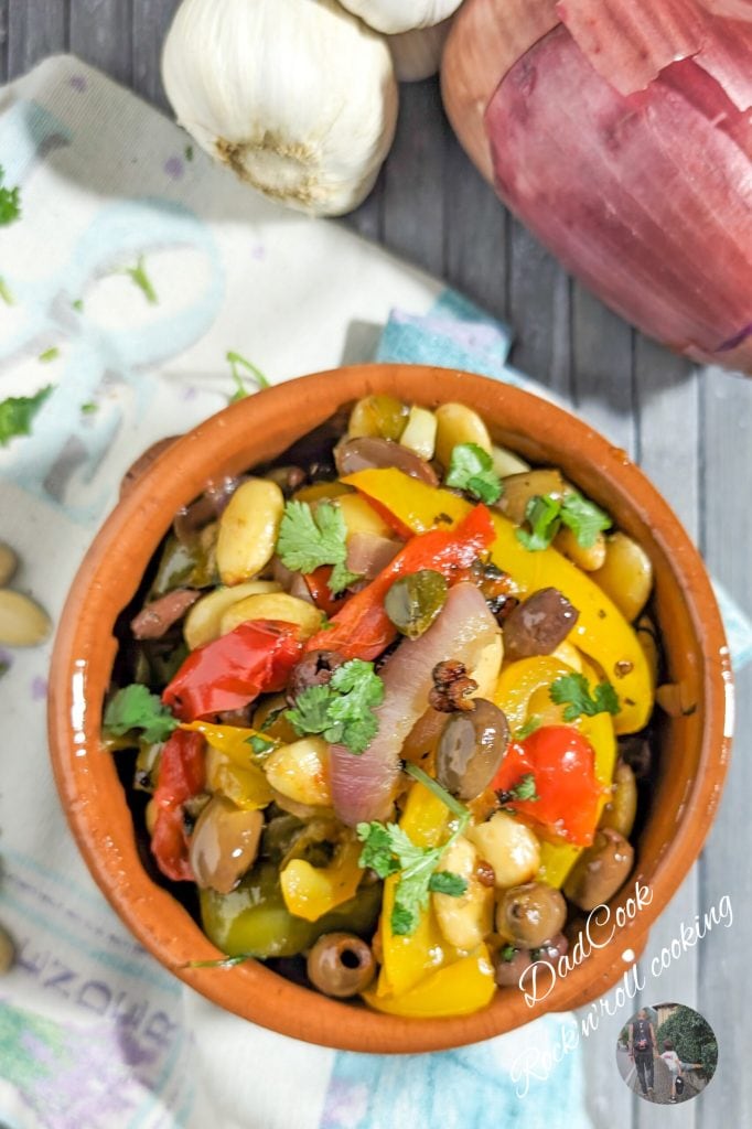 Pan-fried peppers with olives, capers, and almonds: a rich and flavorful side dish