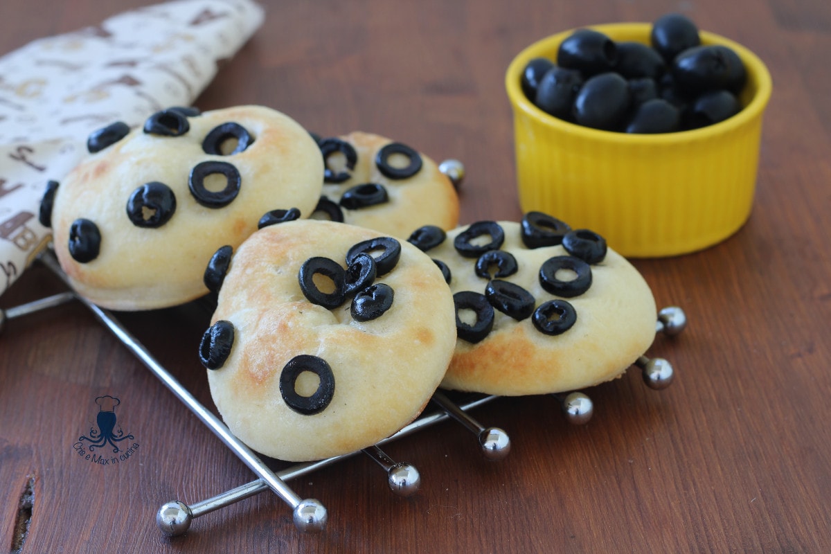 Olive flatbreads, excess liquid sourdough.