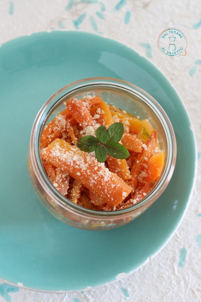 Carrot sticks cooked in a jar