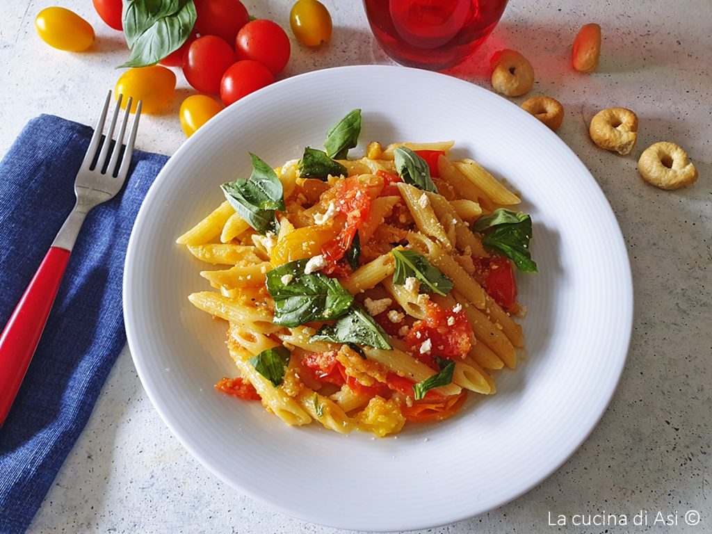 Penne Rigate with Red and Yellow Cherry Tomatoes, Taralli, and Basil