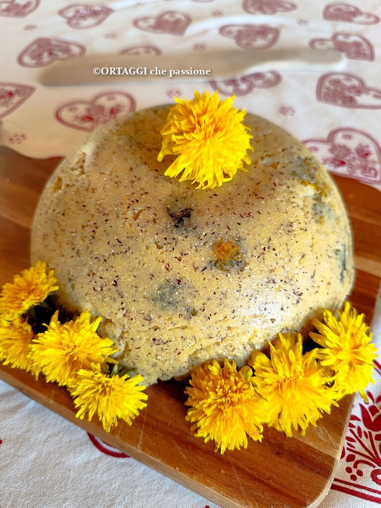 Polenta with dandelion flowers