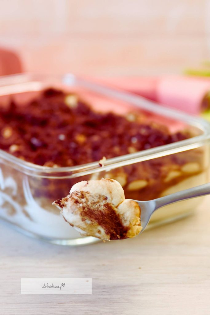 Spoon of eggless tiramisu with mascarpone cream