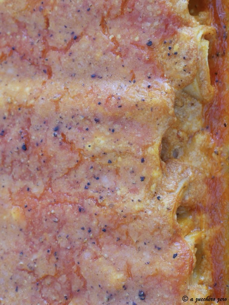 Rolled Lasagna with Ricotta and Tomato baked in a pan