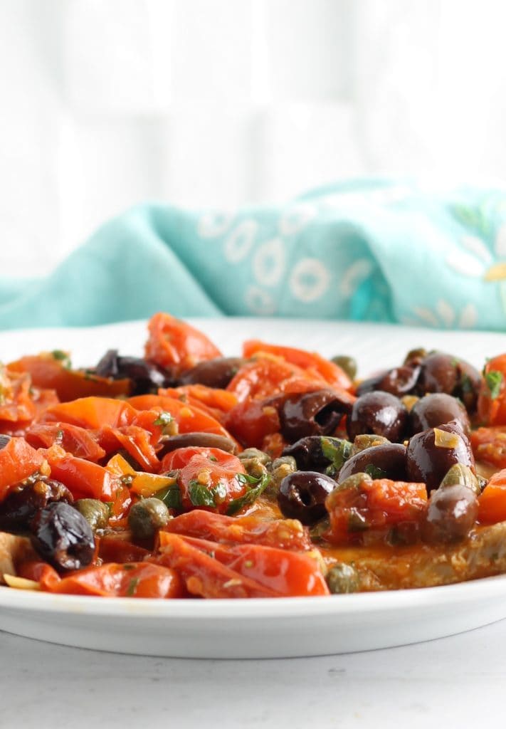 Swordfish with capers, olives, and cherry tomatoes