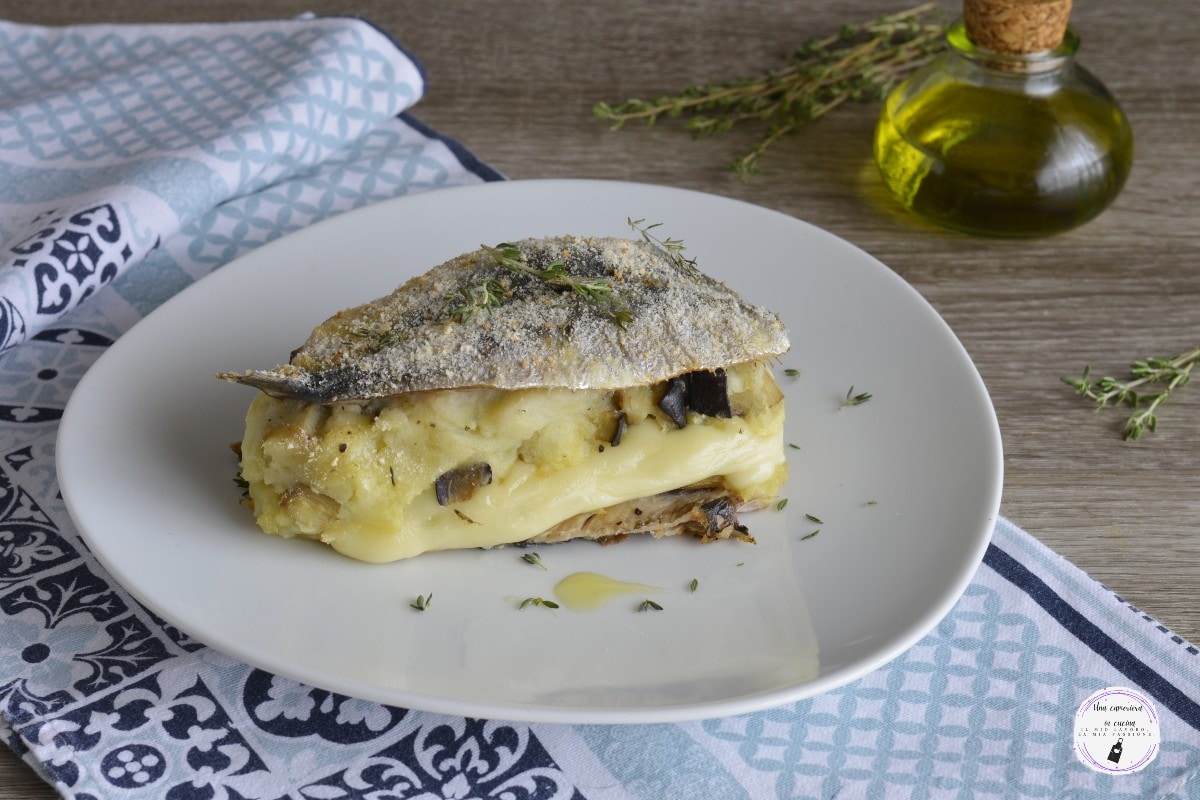 Sardine Fillets with Potatoes, Eggplants, and Cheese