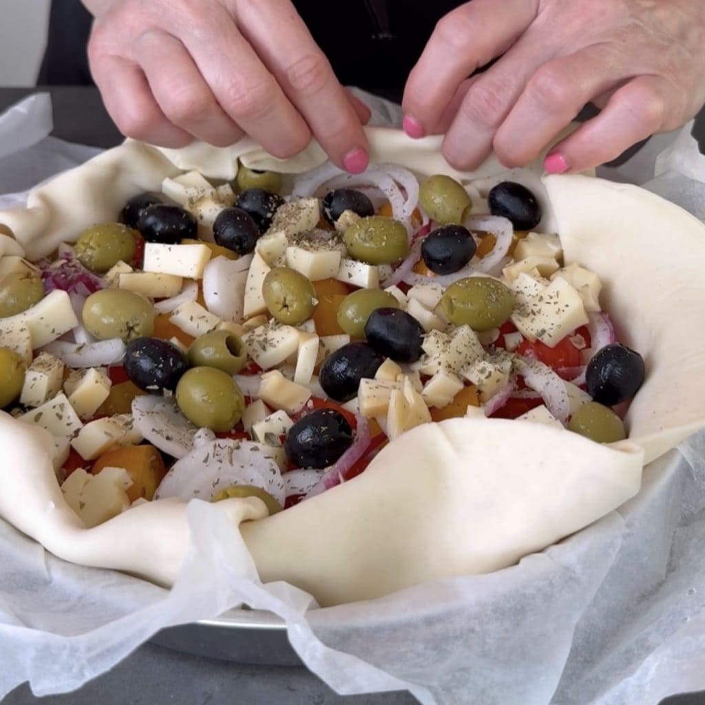 Savory pie with cherry tomatoes and smoked cheese