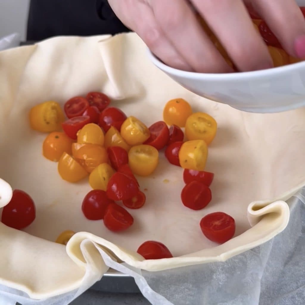 Savory pie with cherry tomatoes and smoked cheese