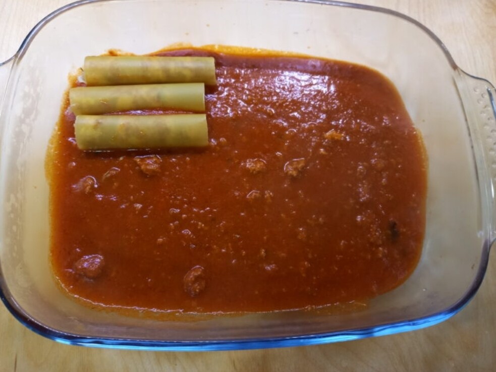 Sausage-Stuffed Cannelloni with Ragù and Béchamel