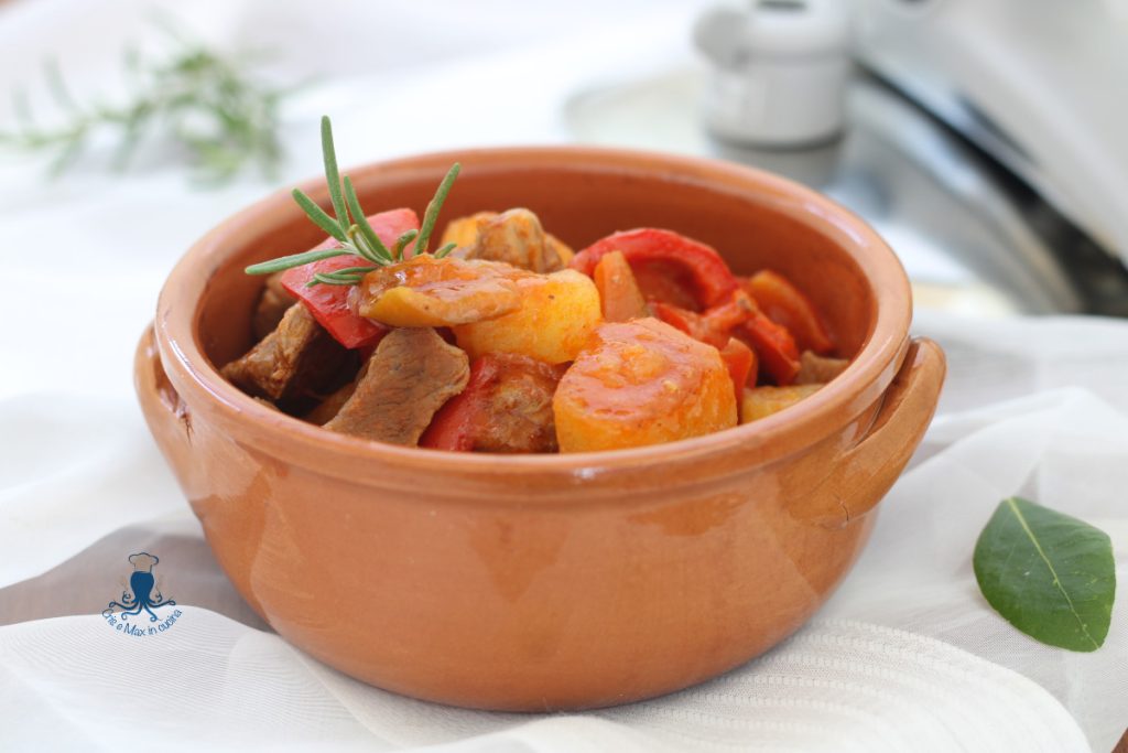 Stew with potatoes and peppers in a pressure cooker