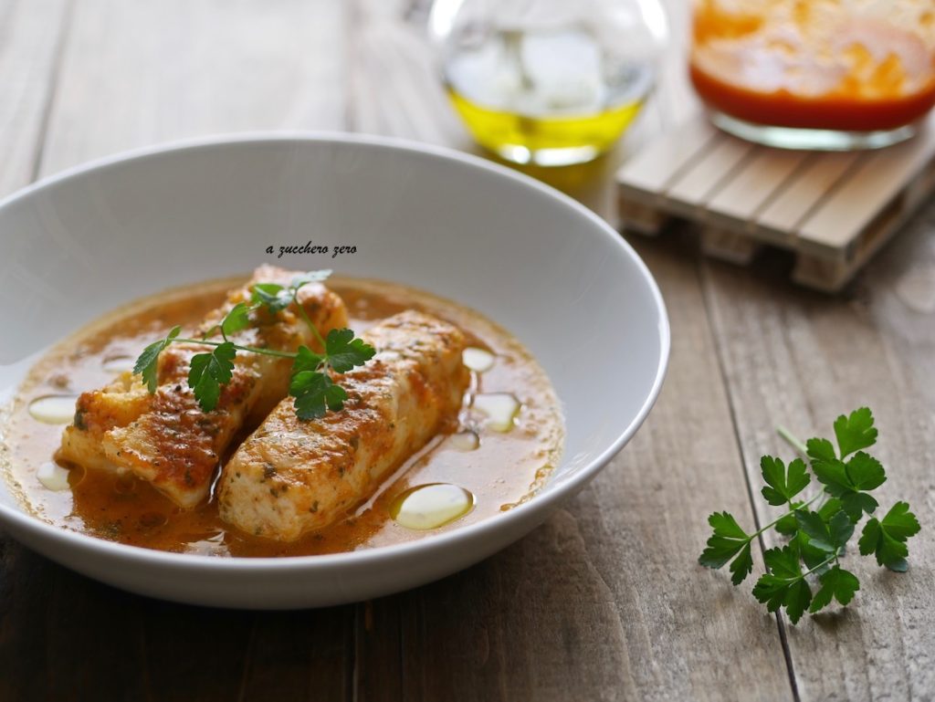 Stewed cod fillets with tomato sauce