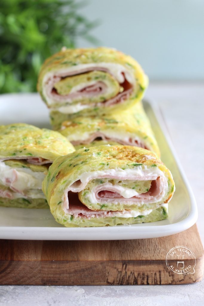 rolled zucchini and potato omelet cooked in microwave stuffed with cheese and ham