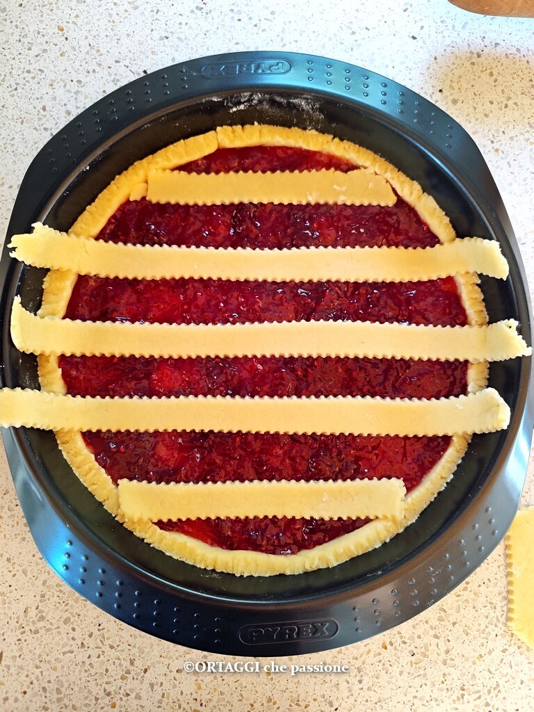 lay the first strips of the jam tart