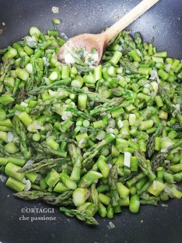 adding asparagus tips