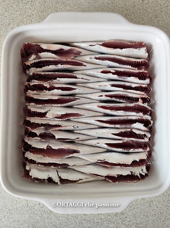 arrange the sardines in the baking dish