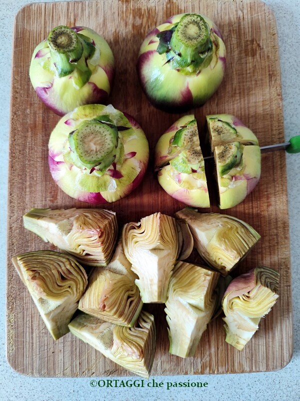 cutting artichokes into wedges