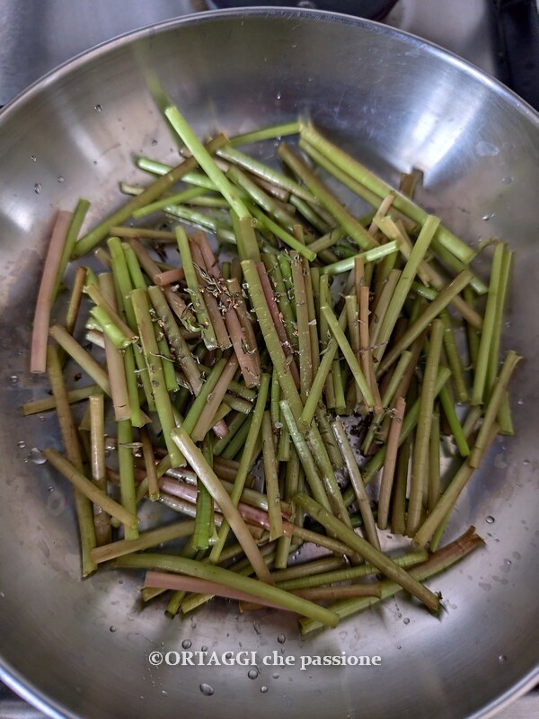 dandelion stems in a pan