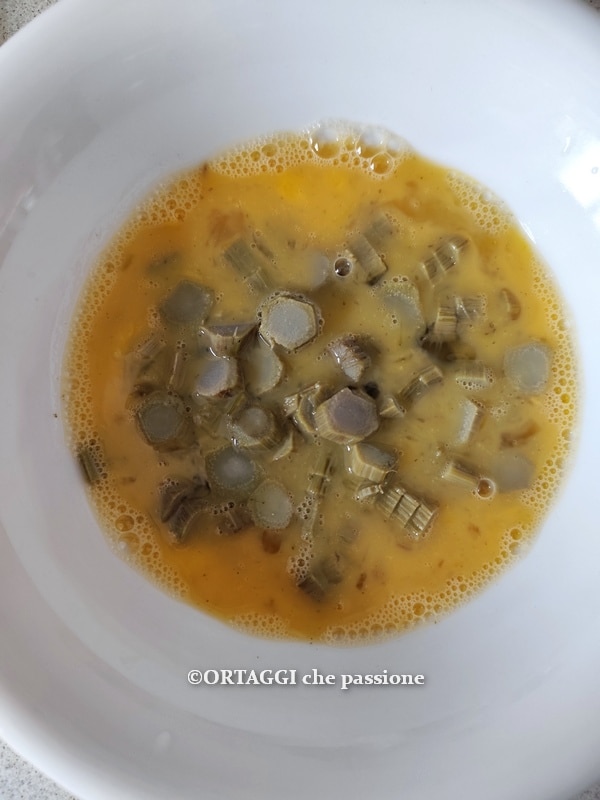 add artichokes to eggs