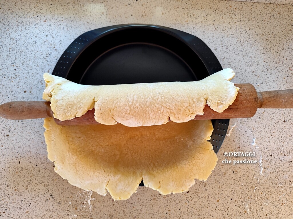 unroll spread pastry dough over pan