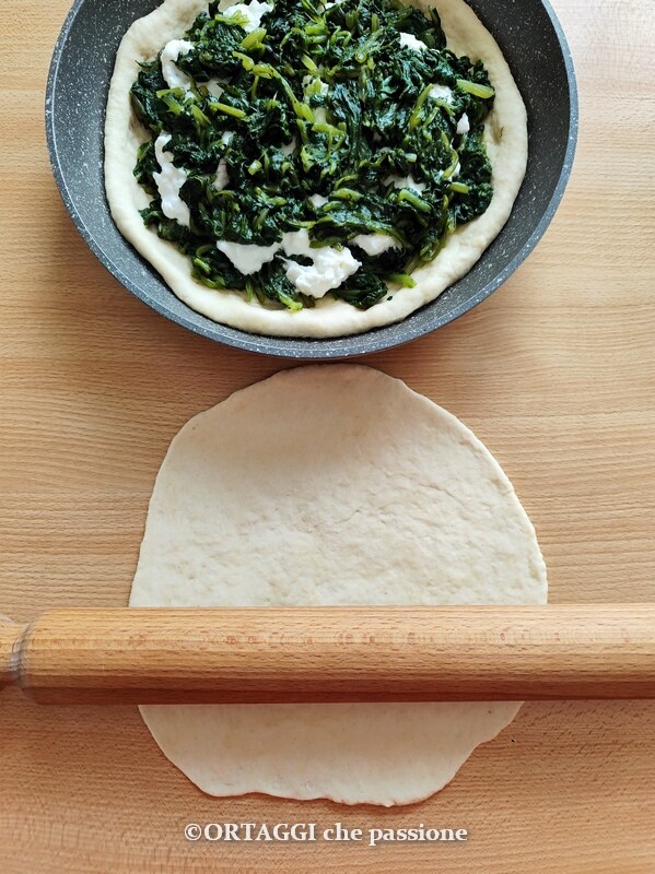 roll out another piece of dough