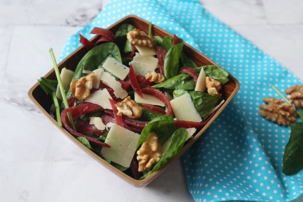 baby spinach with bresaola, grana, and walnuts