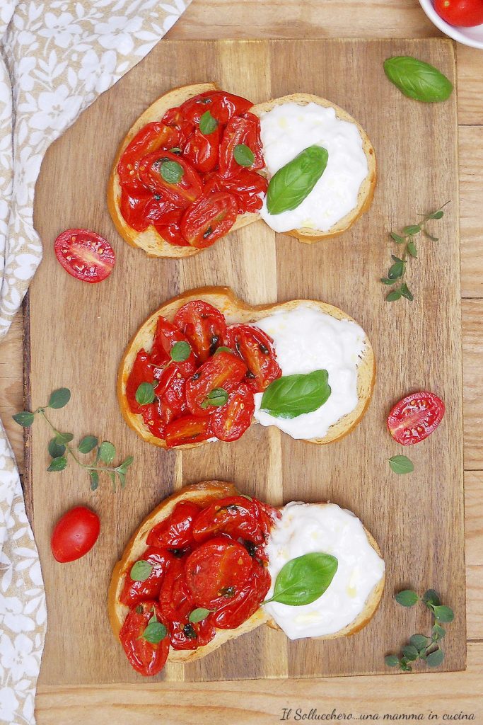 Bruschetta with confit cherry tomatoes and stracciatella