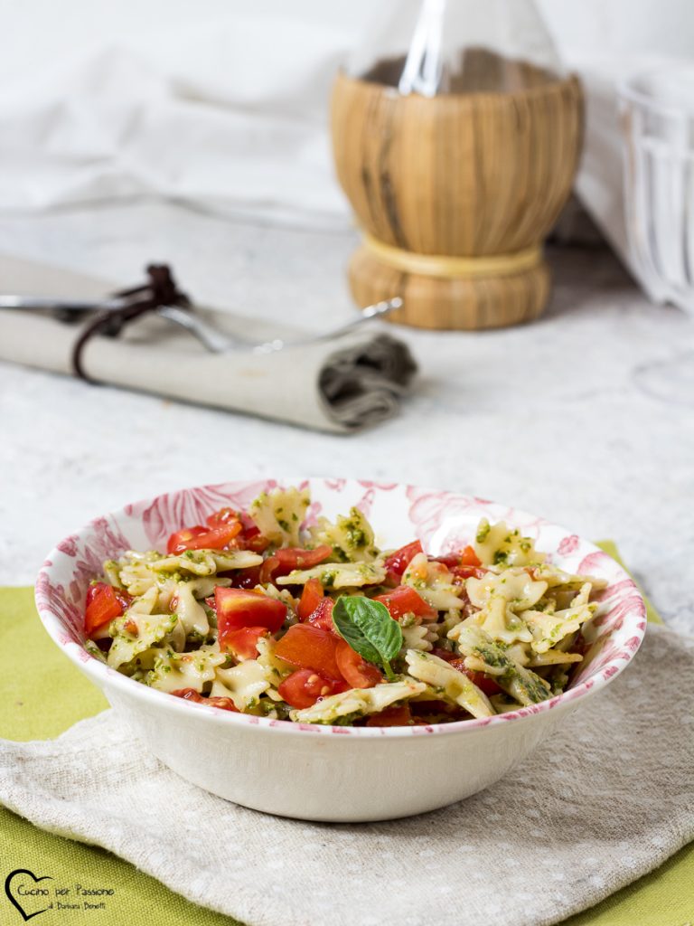 cold pasta with pesto and cherry tomatoes