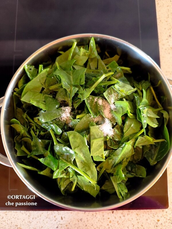 cook spinach with oil and salt