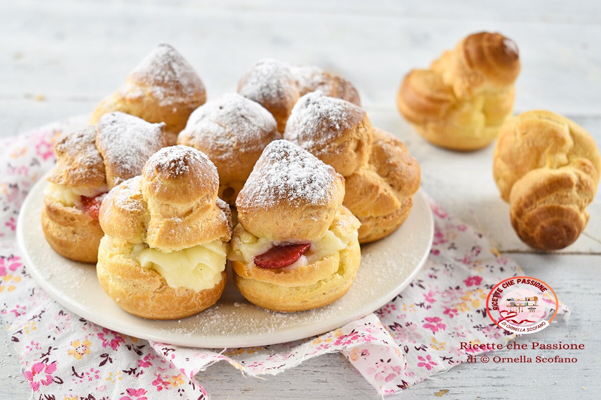 The most delicious cream puffs with custard and strawberries