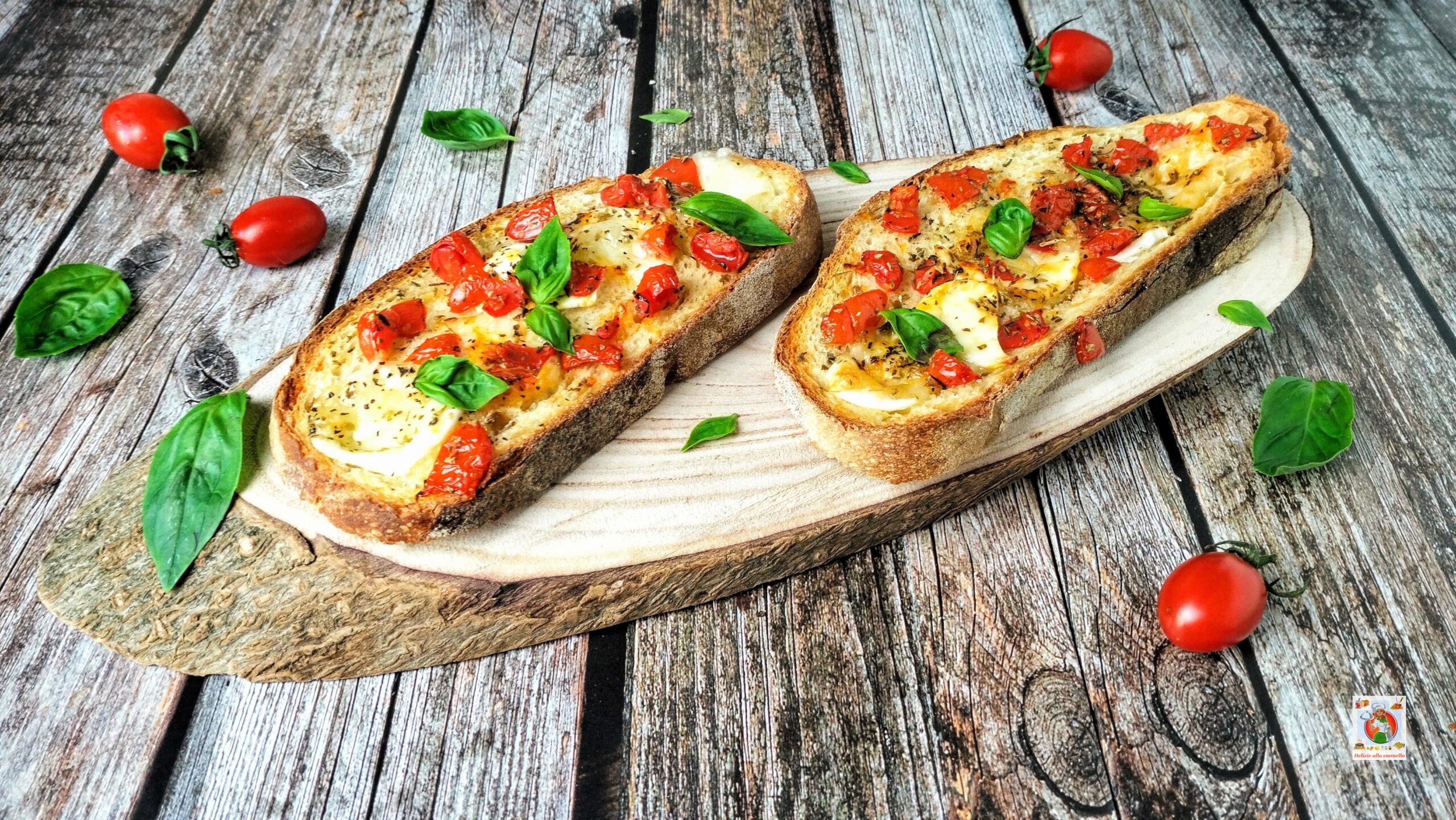 Crostini with Cherry Tomatoes and Baked Mozzarella: tempting finger food to prepare on the fly.