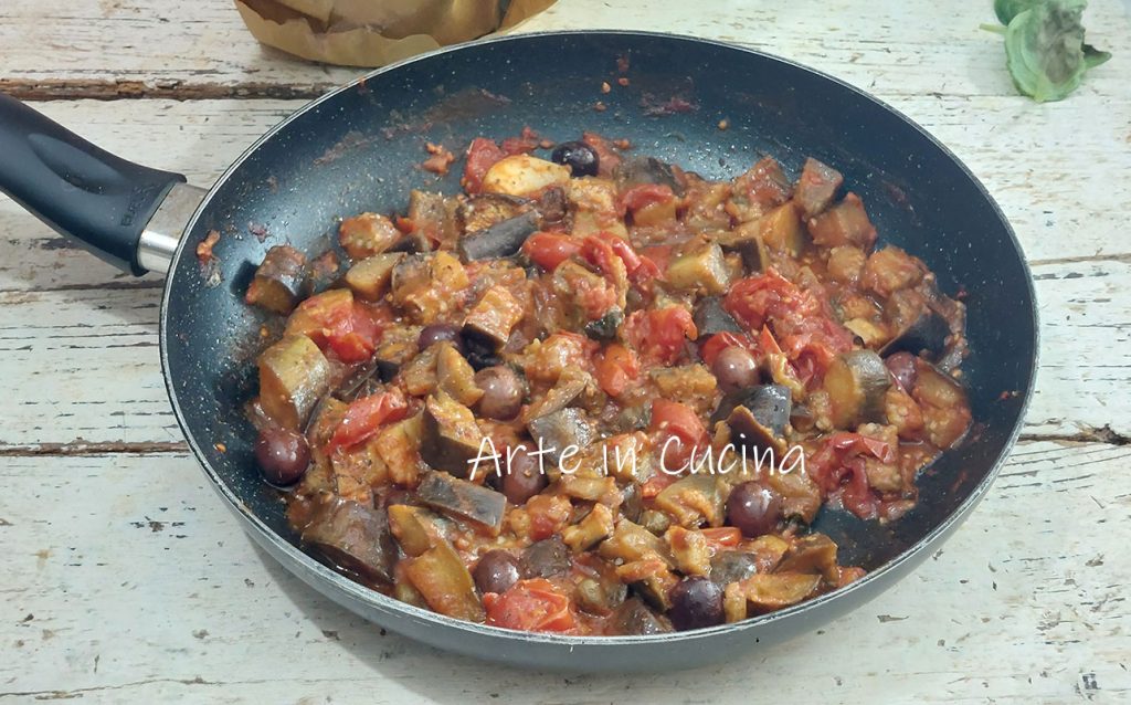 EGGPLANTS with OLIVES and CAPERS in a pan