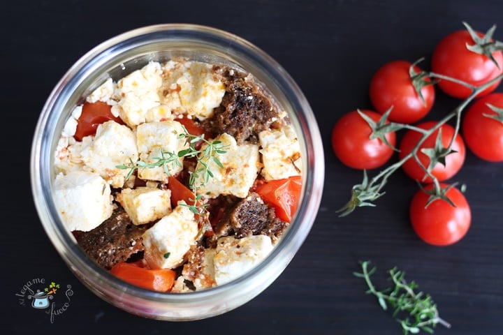Feta in Jar Cooking with Black Bread and Cherry Tomatoes