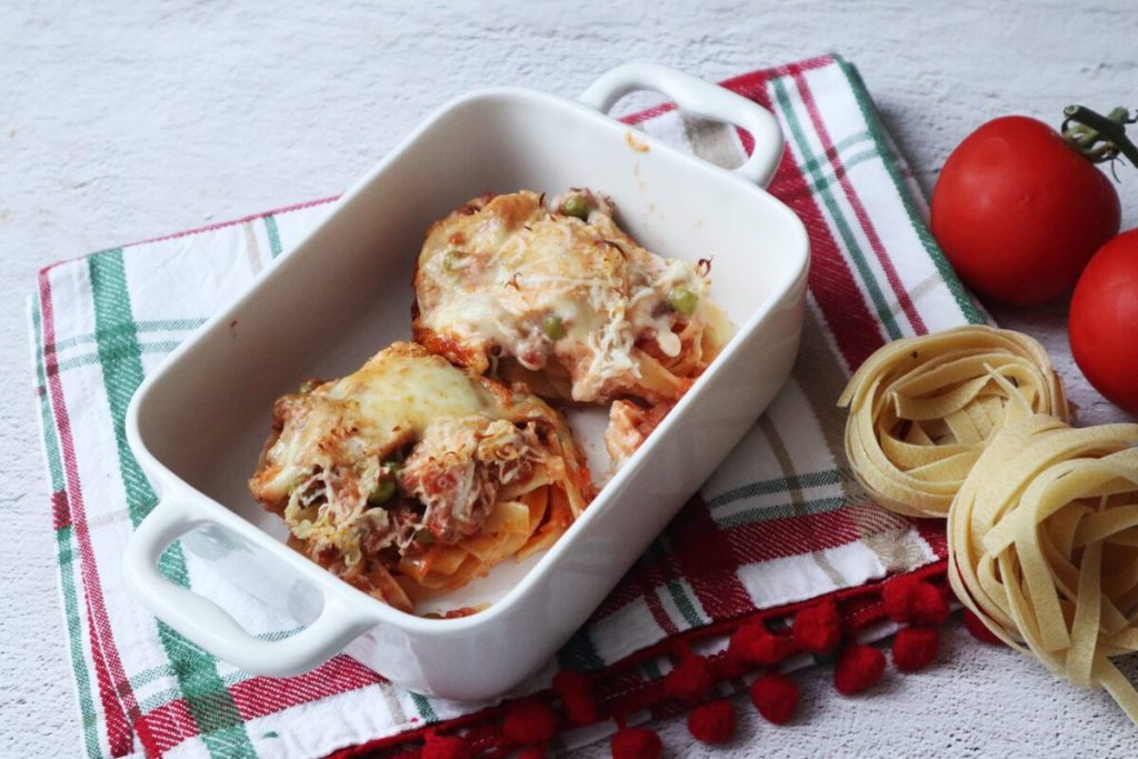 Fettuccine Nests with Meat Sauce and Peas