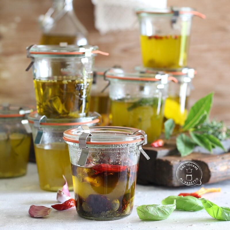 oils in a jar with sun-dried tomatoes flavored with spices and herbs in microwave jar cooking