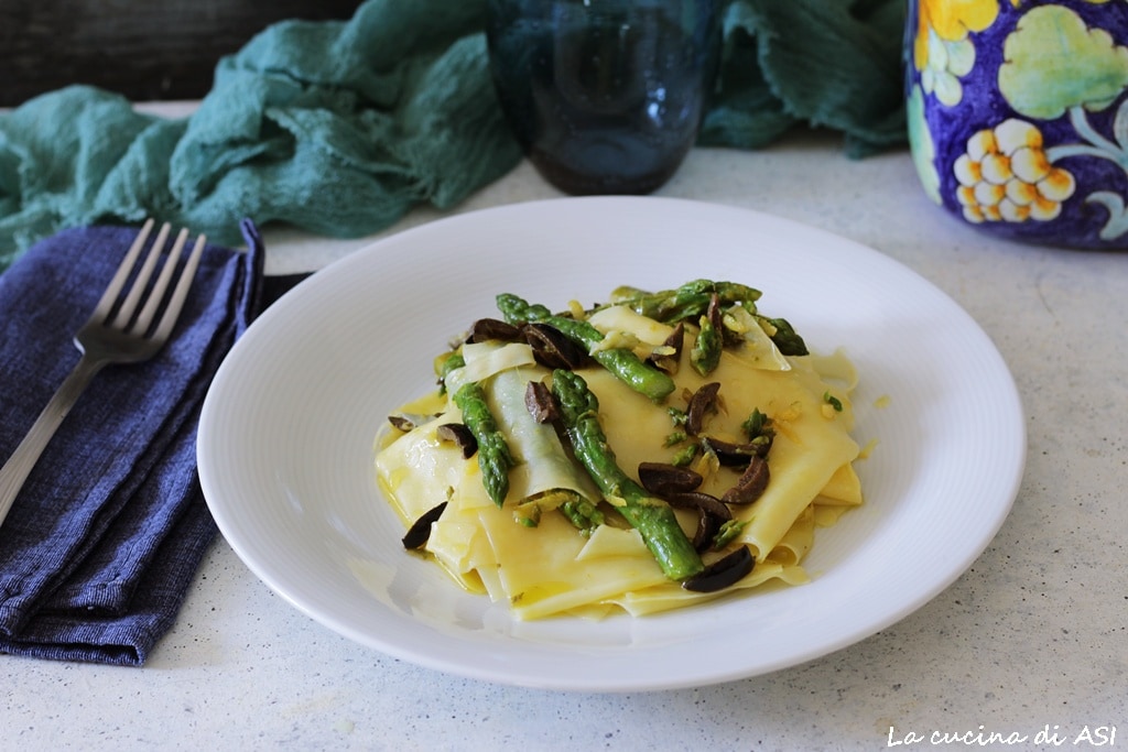 fresh pasta sheets with asparagus, olives, and lemon