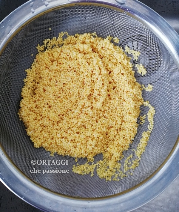 gluten-free grain washing under running water