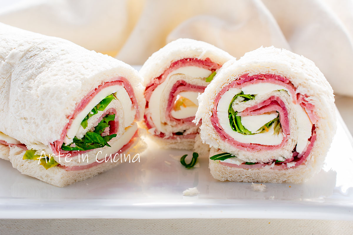 SANDWICH ROLL with rolled white bread and ham