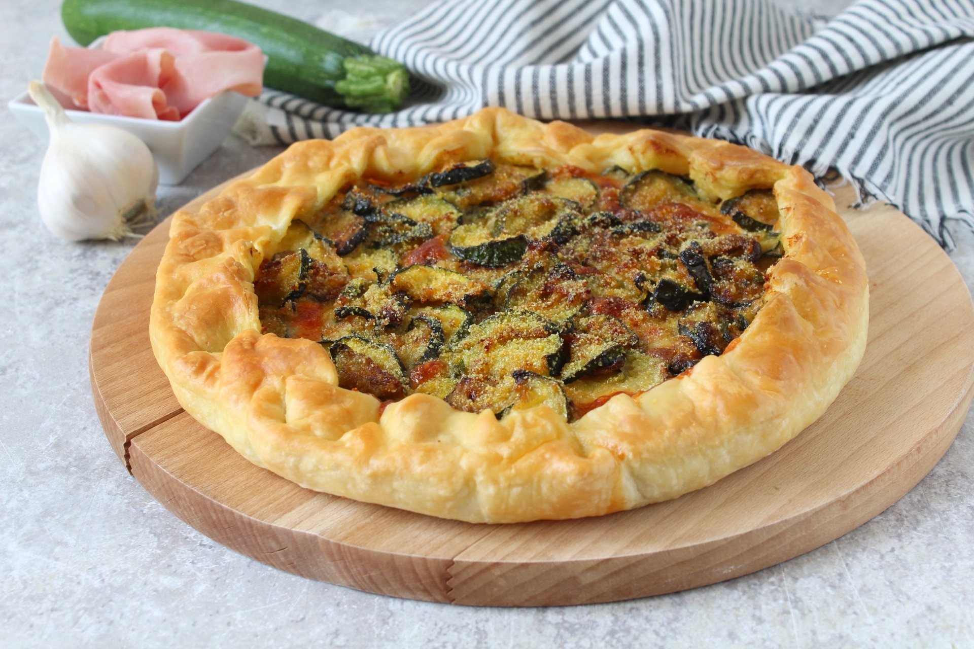 Savory Pie with Zucchini, Cooked Ham, and Stracchino Cheese