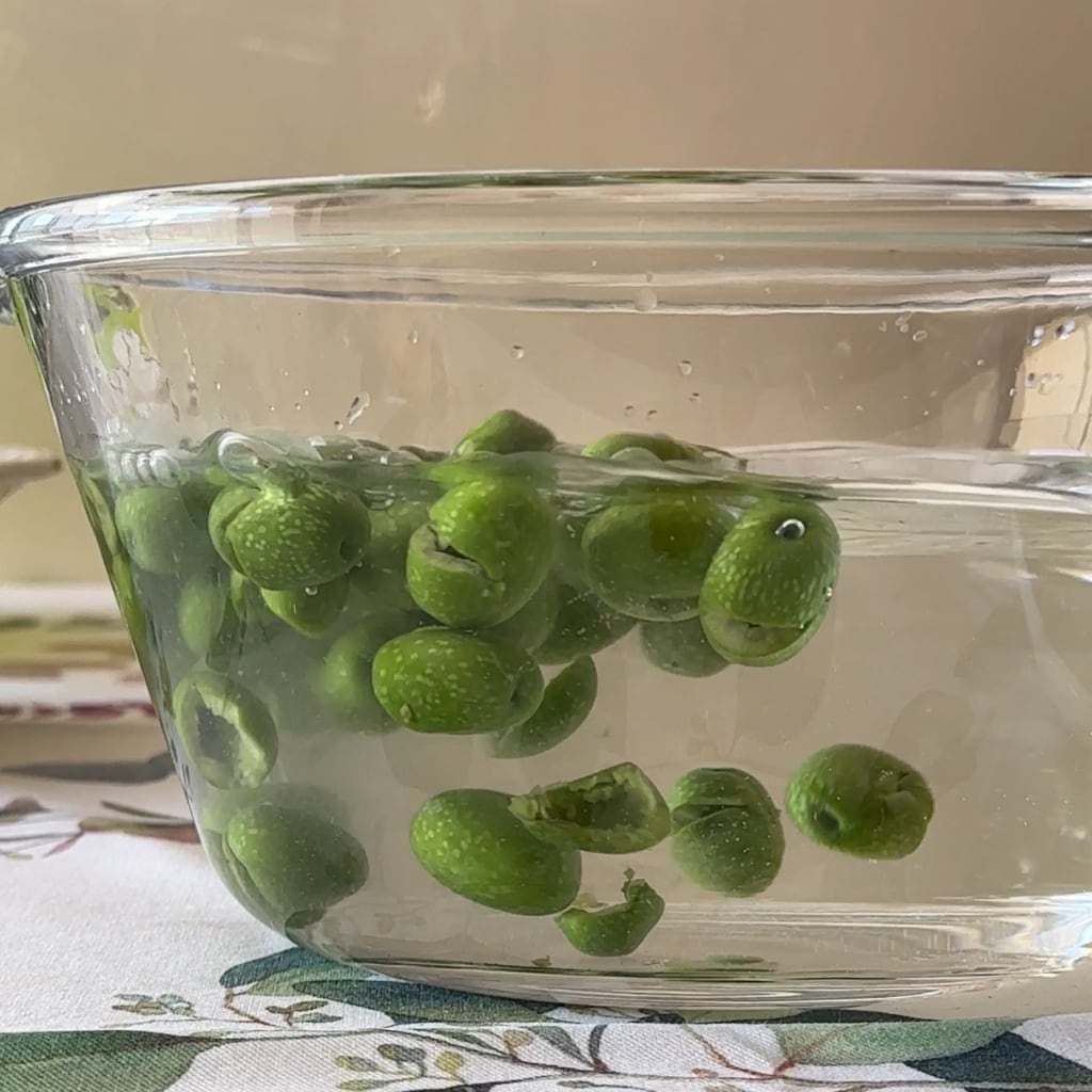 crushed green olives in water to sweeten