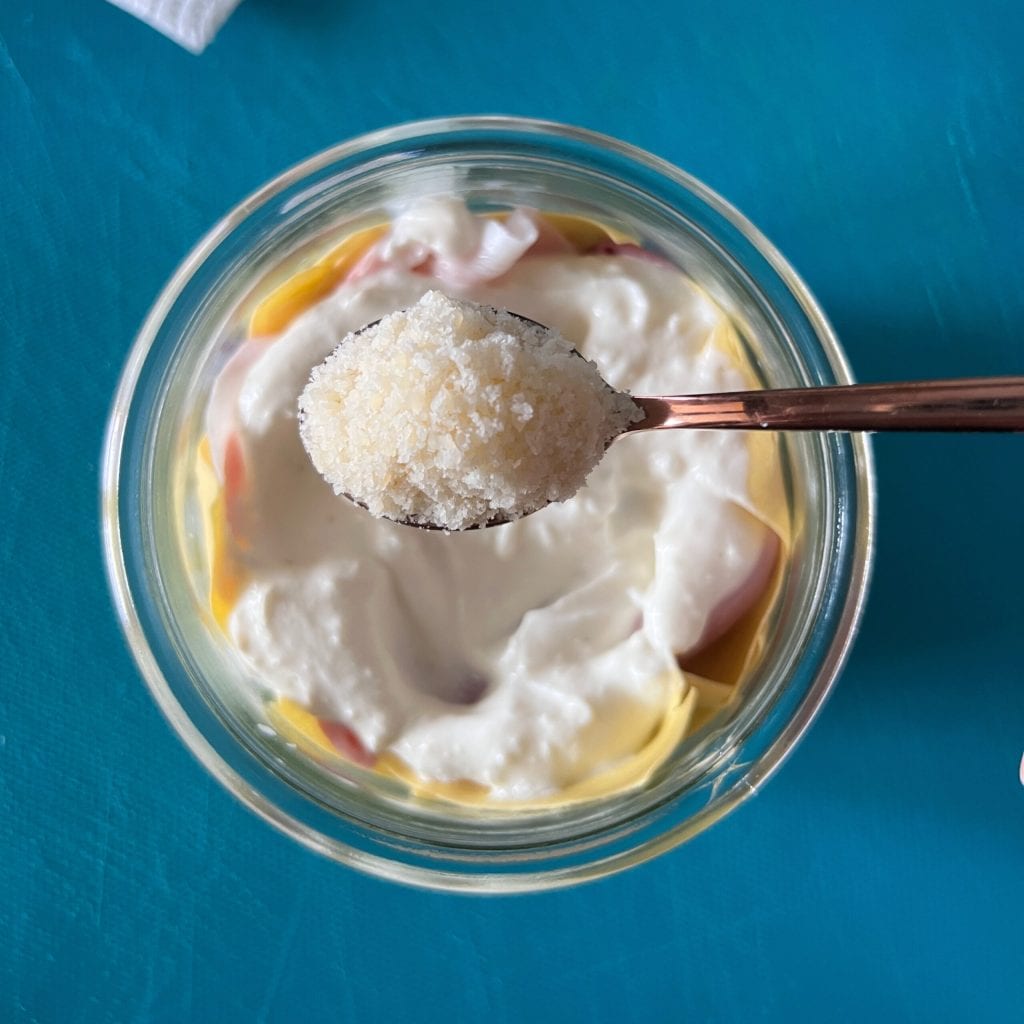 lasagna with cheese and ham in jar cooking in the microwave
