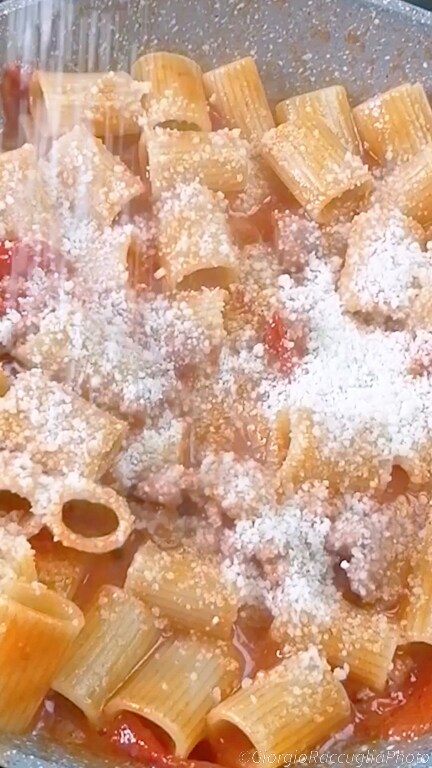 mezze maniche with sausage and cherry tomatoes