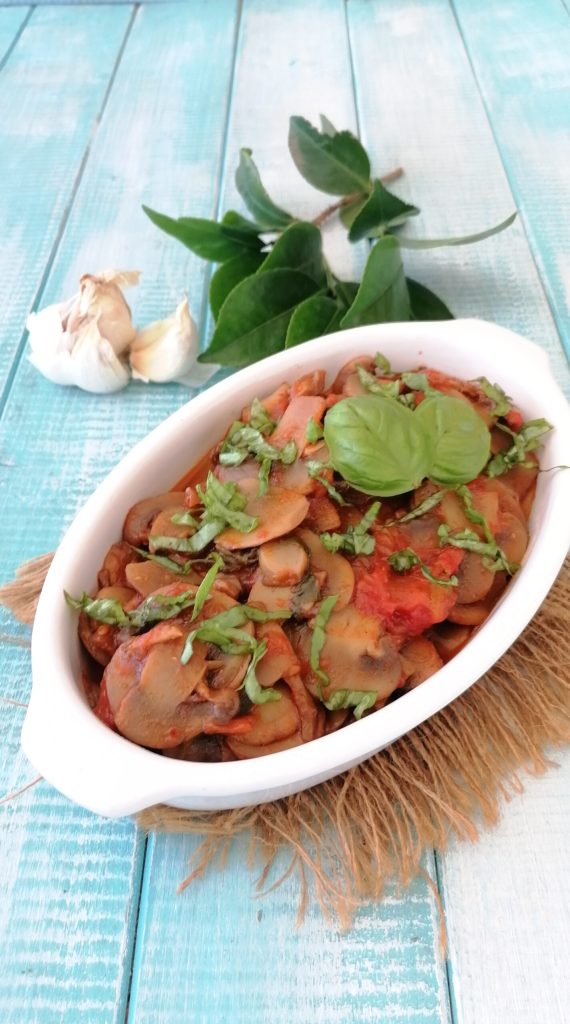 mushroom champignons in tomato sauce