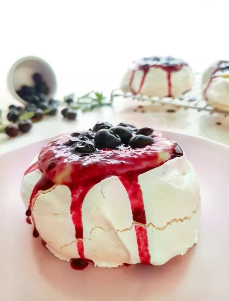 mini pavlova with cream and blueberries